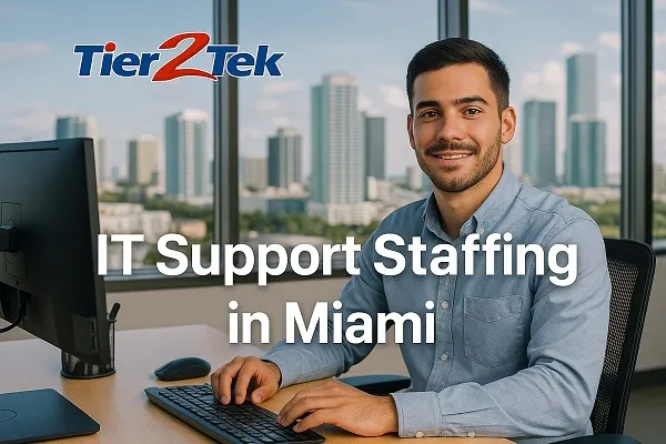 IT support professional at work in a Miami office with city skyline in background