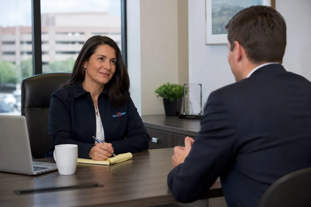 Tier2Tek recruiter interviewing a CAD candidate, evaluating technical experience, communication skills, and professional qualifications during the hiring process.