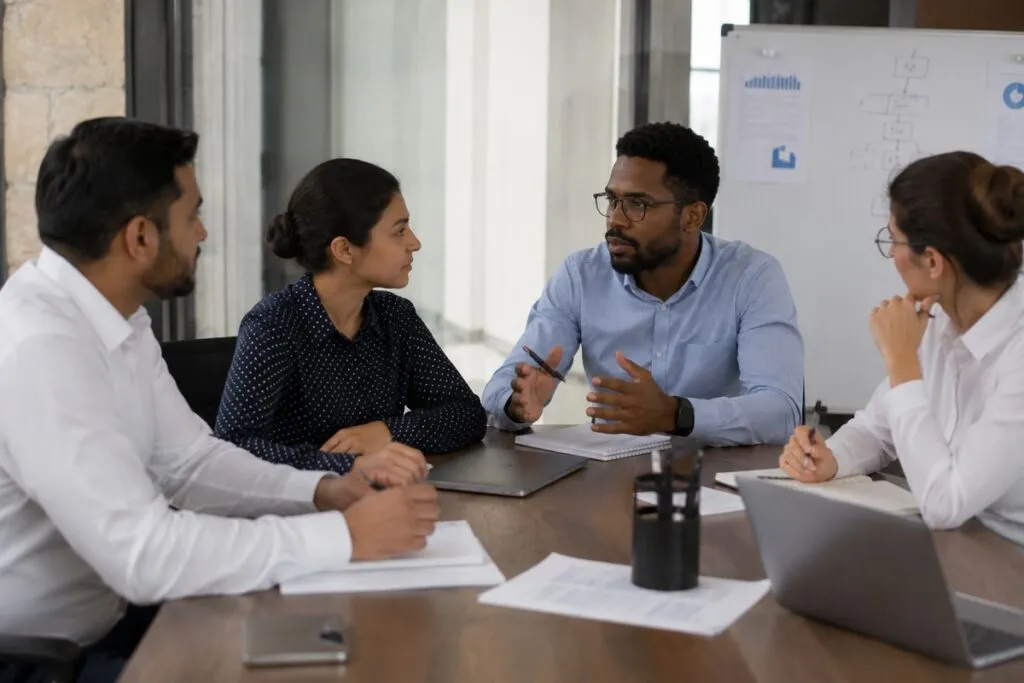 IT support team collaborating on technical support planning, infrastructure management, and service improvement initiatives.